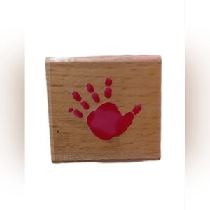 Wooden Stamper with Red Handprint Design